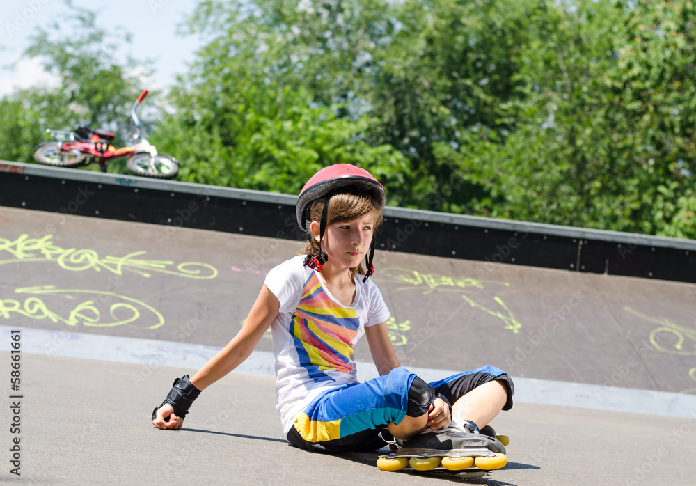 Young female skater at the skate park