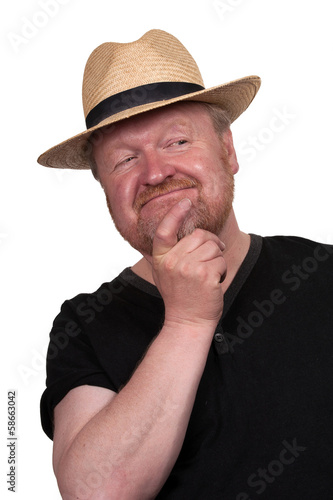 Happy middle aged man in straw hat