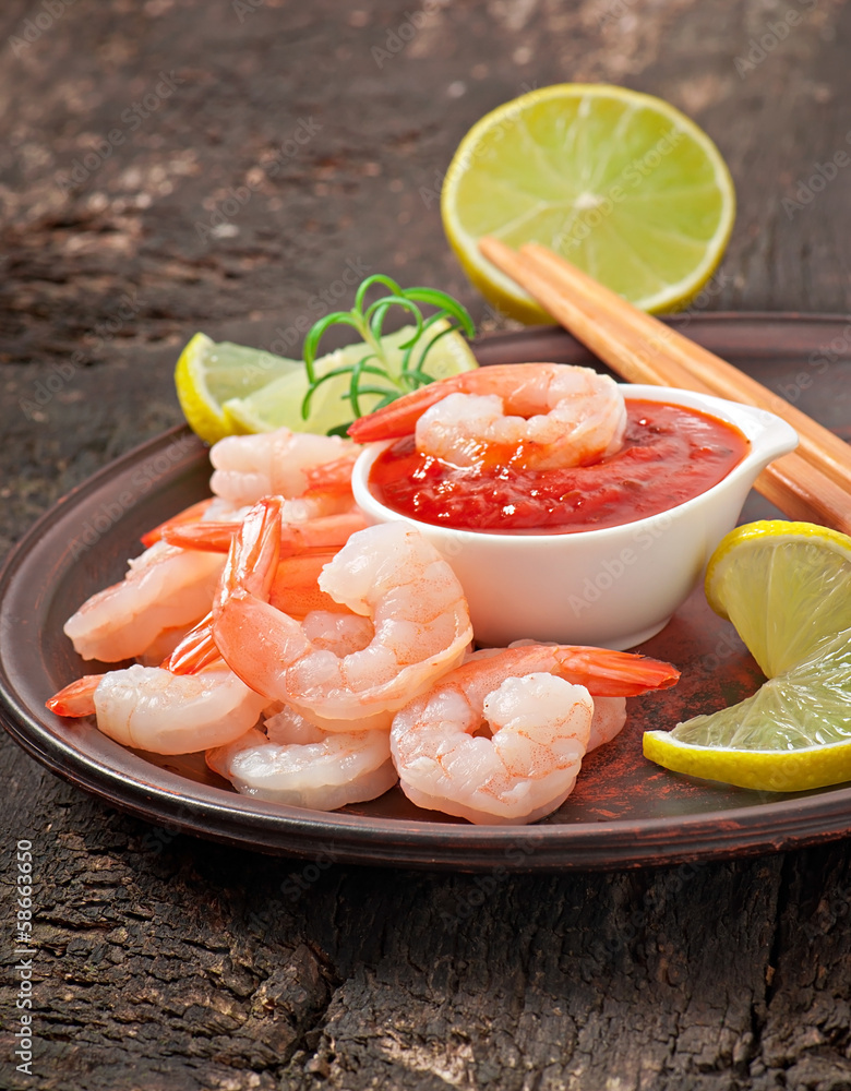 tails of shrimps with fresh lemon and rosemary in ceramic plate tails of shrimps with fresh lemon and rosemary in ceramic plate