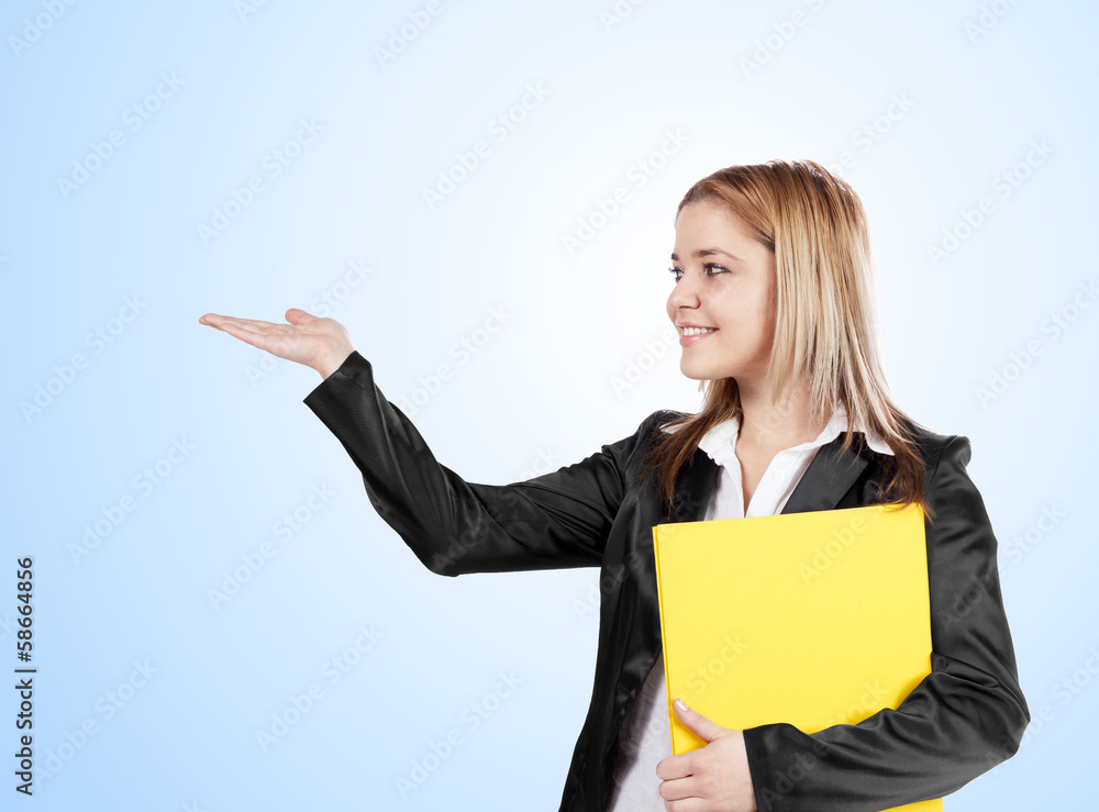 Young blonde business woman holding yellow file. Young blonde business woman holding yellow file.
