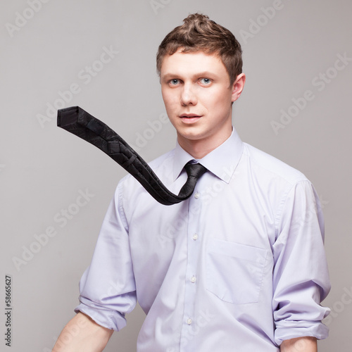 dynamic shot of guy with flying tie