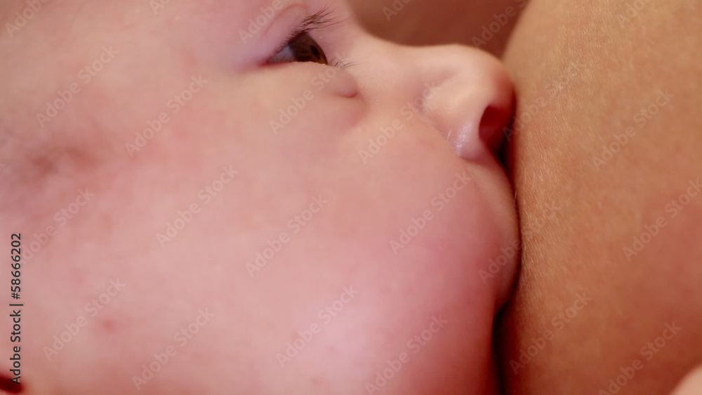 Mother nursing baby Mother nursing baby
