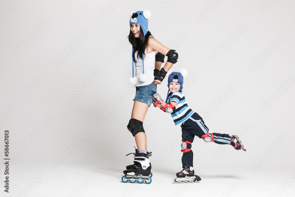 Mother and son in roller skates