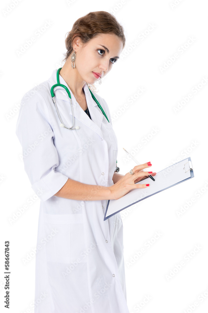Young doctor is studying the paper, prescriptions, medical histo Young doctor is studying the paper, prescriptions, medical histo
