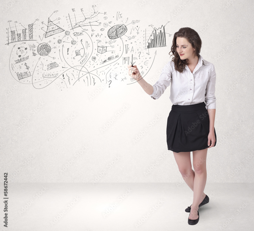 Pretty girl sketching graphs and diagrams on wall Pretty girl sketching graphs and diagrams on wall