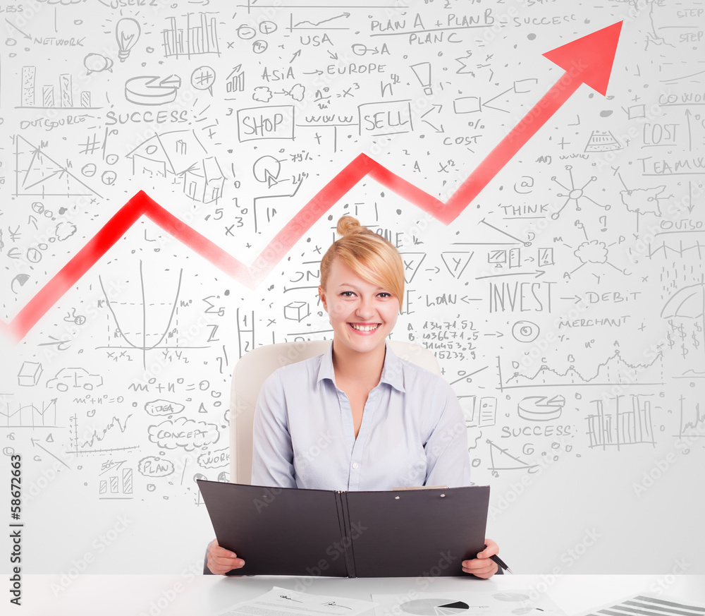 Business woman sitting at table with market diagrams Business woman sitting at table with market diagrams