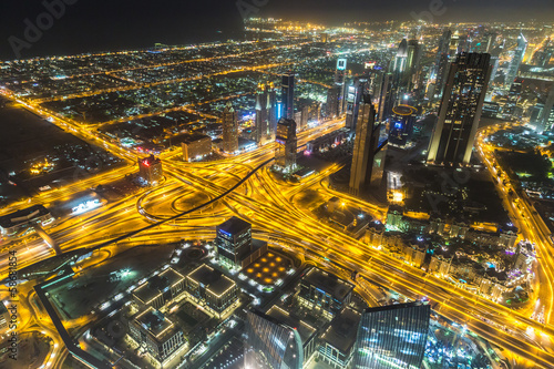 Dubai downtown night scene with city lights,