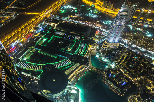 Dubai downtown night scene with city lights,