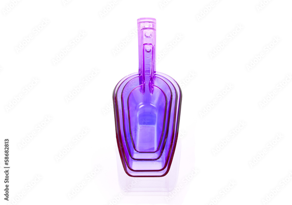 Four plastic violet transfer scoop used in cooking Four plastic violet transfer scoop used in cooking