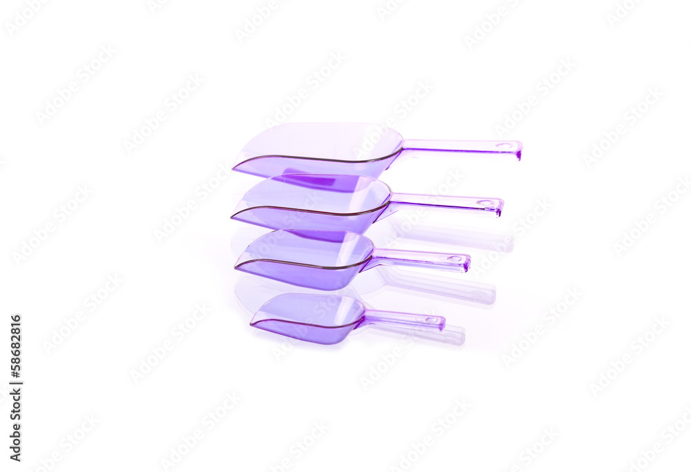 Four plastic violet transfer scoop used in cooking Four plastic violet transfer scoop used in cooking