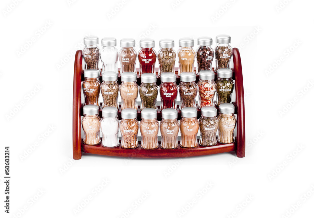 spice rack full of a variety of different spices and herb spice rack full of a variety of different spices and herb