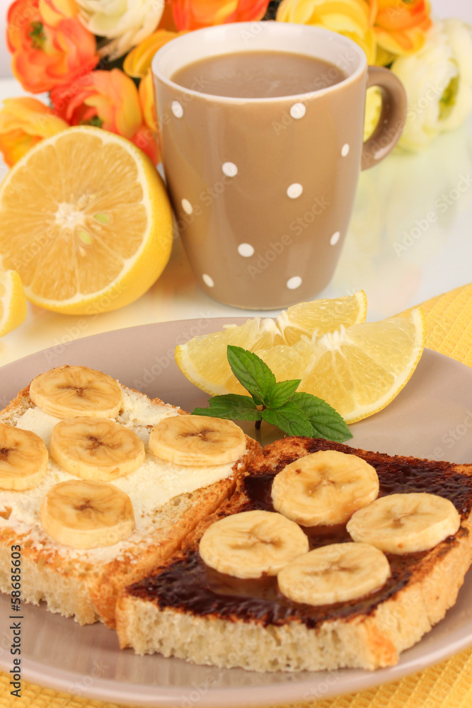 Delicious toast with bananas on plate close-up Delicious toast with bananas on plate close-up