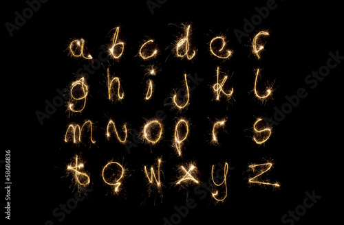Shiny alphabet isolated on black