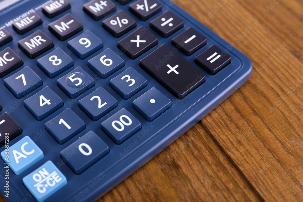 Digital calculator on table close-up Digital calculator on table close-up