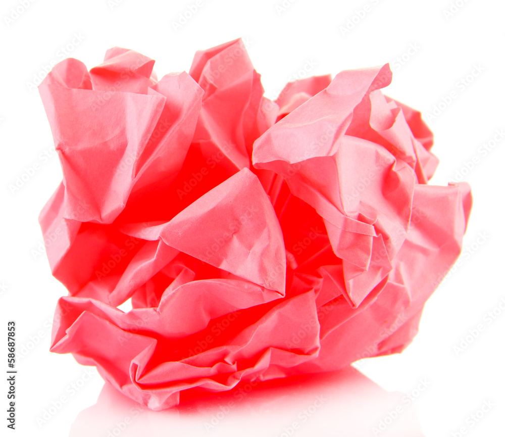 Pink crumpled paper ball isolated on white