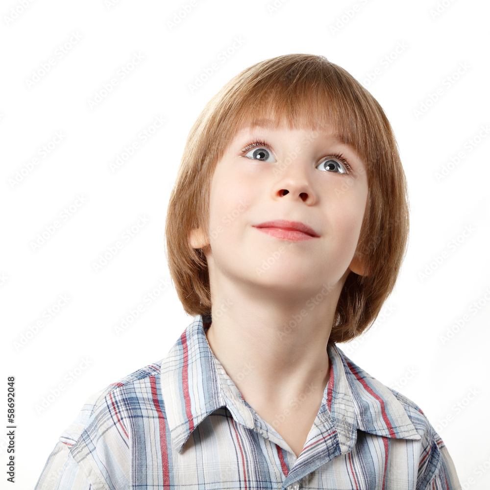 cute little boy looking up over white cute little boy looking up over white