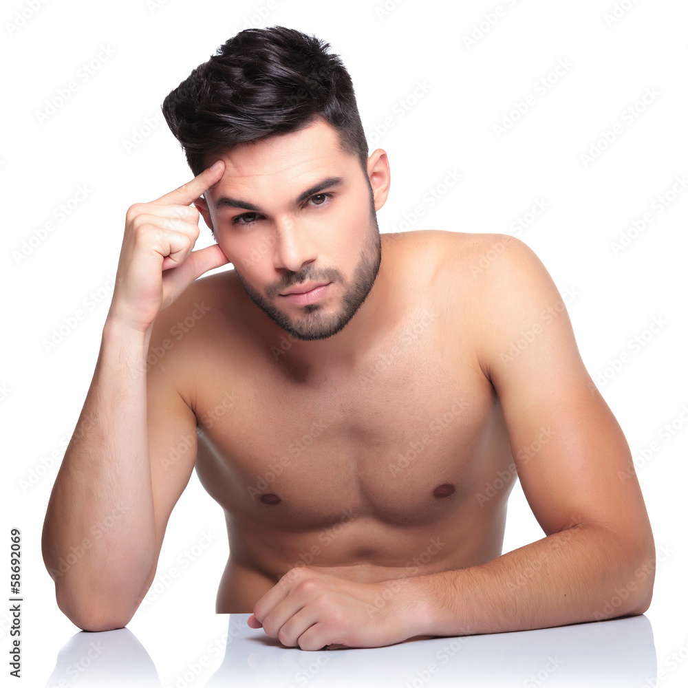 Fototapeta premium calm naked pensive man looking at the camera