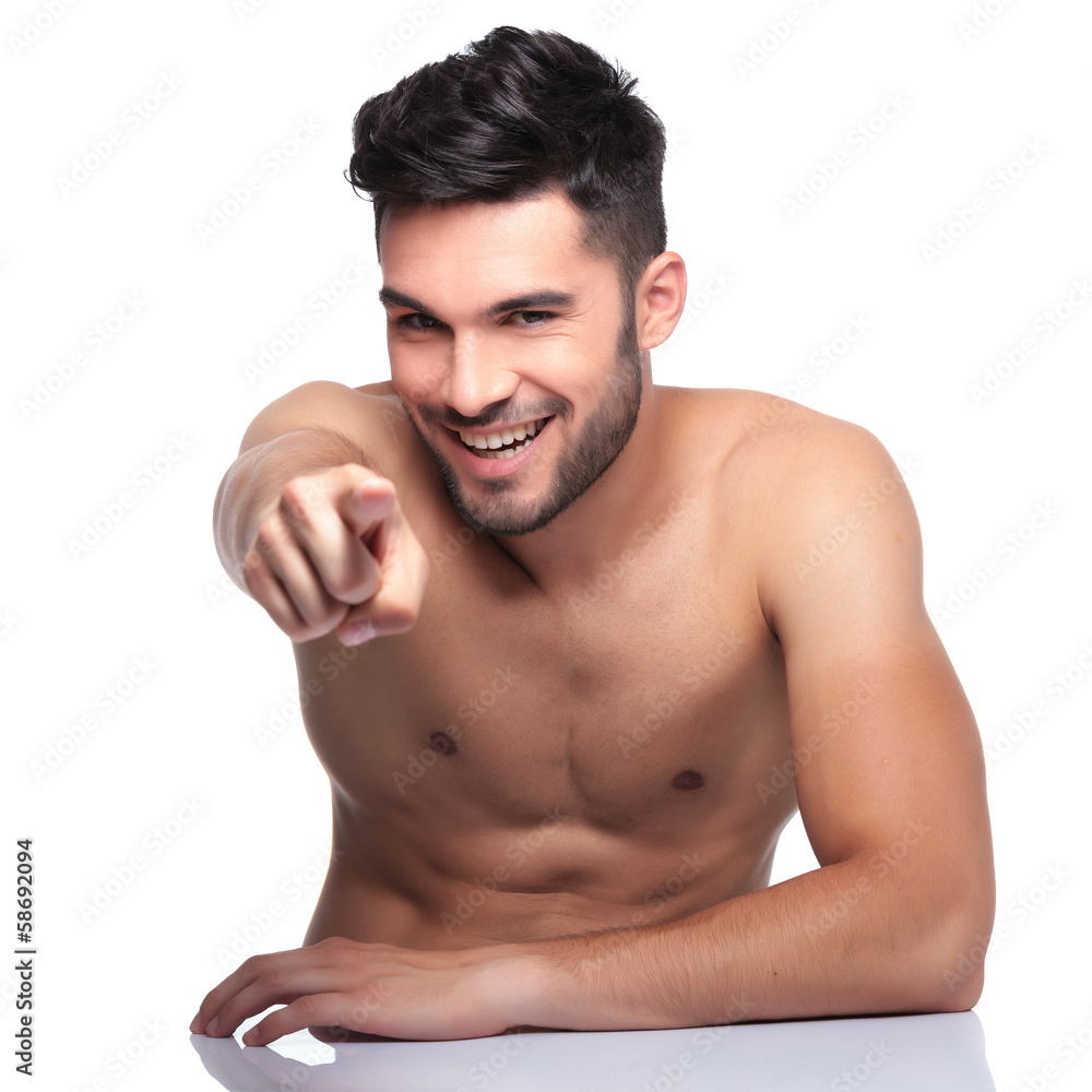 Fototapeta premium young naked man pointing finger to camera