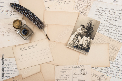 old letters, vintage postcards and antique feather pen
