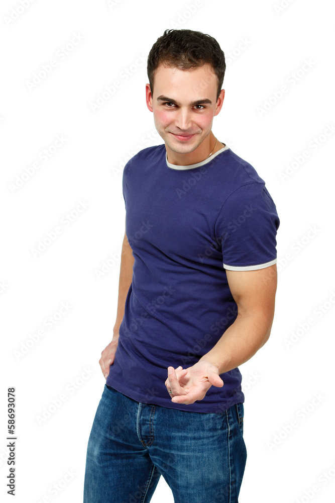 Young cheerful man in purple shirt and jeans, portrait of attrac Young cheerful man in purple shirt and jeans, portrait of attrac