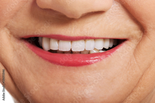 Close up on ol woman s smile  teeth.