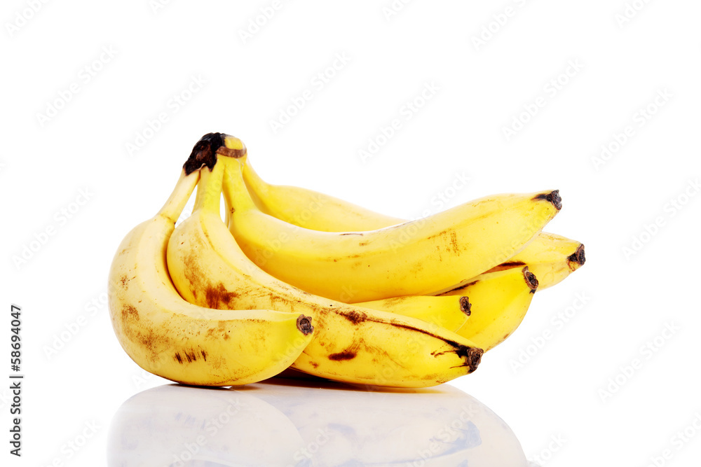 Yellow bananas lying on white. Yellow bananas lying on white.