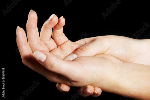 Female's hands rubbing each other.