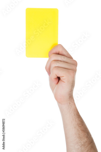 Hand Showing Yellow Card
