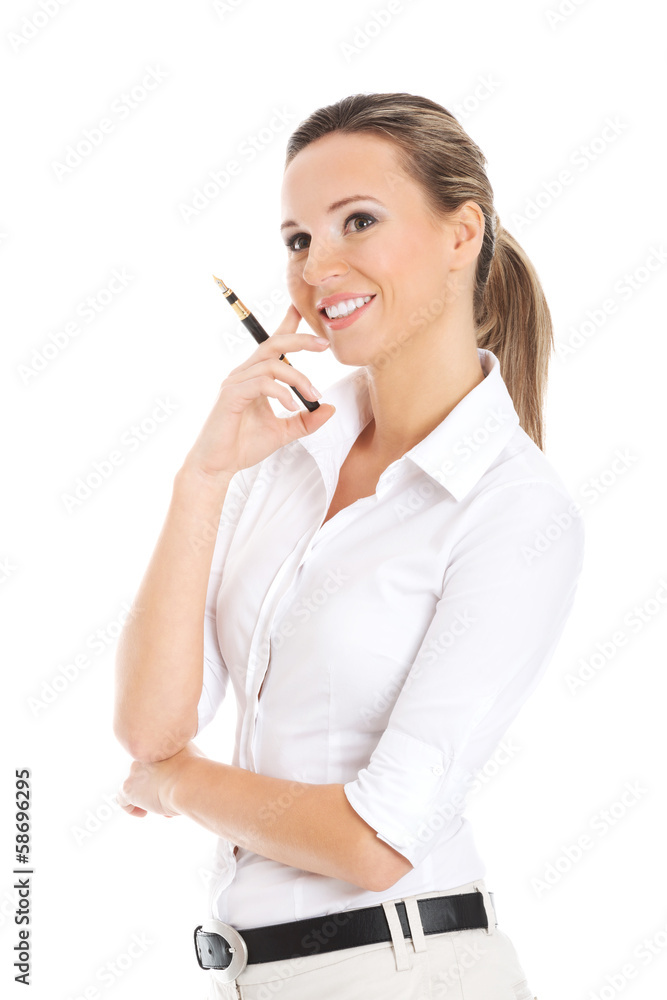 Young business woman holding a pen. Young business woman holding a pen.