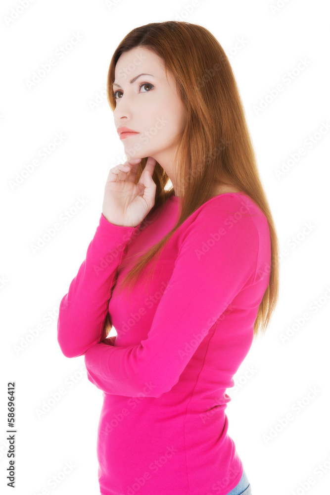 Portrait of attractive casual woman with her hand on face. Portrait of attractive casual woman with her hand on face.