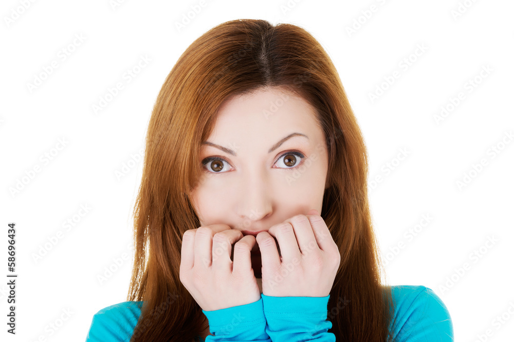 Attractive casual woman expressing fear/ worries. Attractive casual woman expressing fear/ worries.