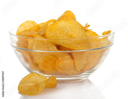 Delicious potato chips in bowl