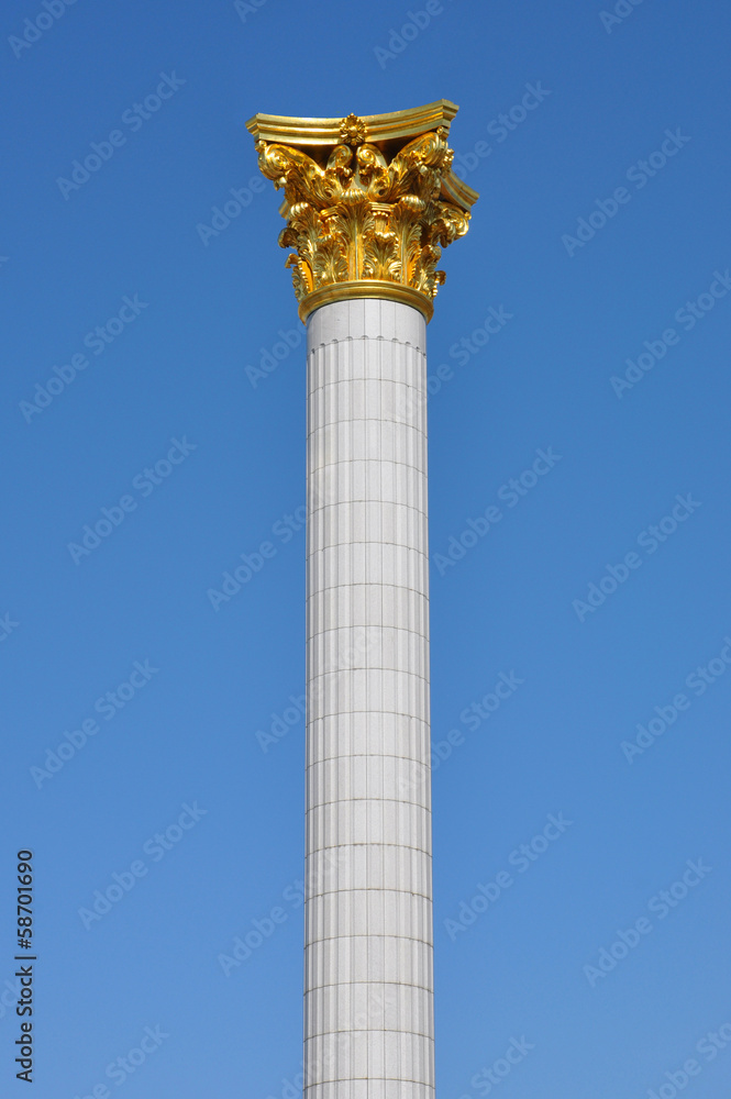 column with a gold ornament