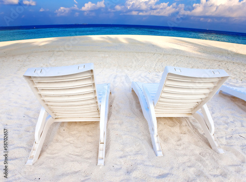 beach chair on the seashore © Konstantin Kulikov