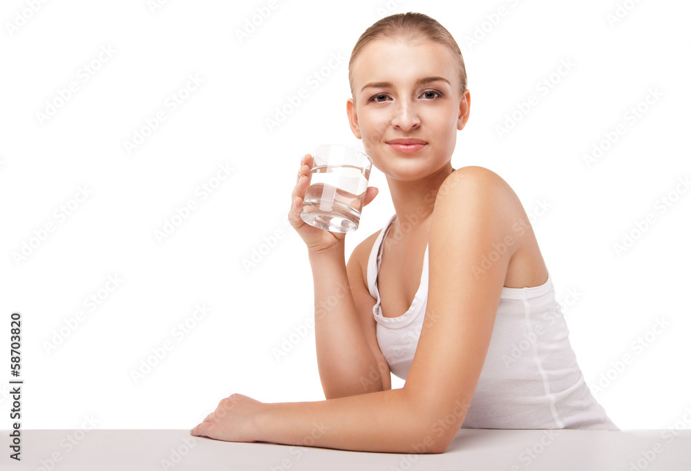 Girl drinking water from glass isolated