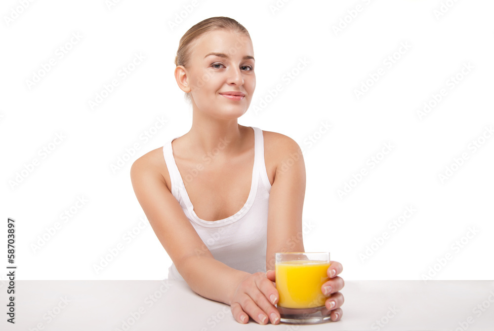 Young woman with a glass of orange juice isolated Young woman with a glass of orange juice isolated