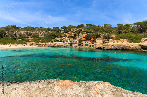Rocks bay beach azure sea water, Cala Llombards, Majorca island
