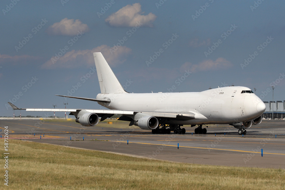 White airplane at airport White airplane at airport