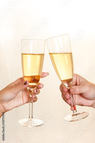 Man and Woman toasting with Champagne glasses