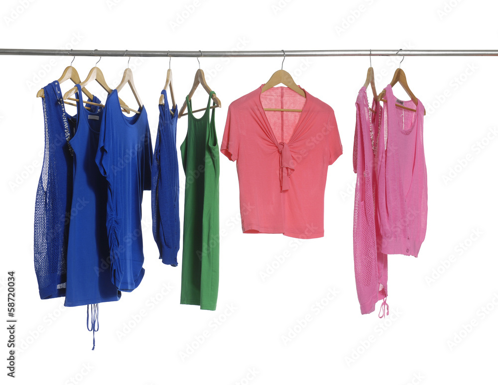 female fashion clothing on hangers at the show female fashion clothing on hangers at the show