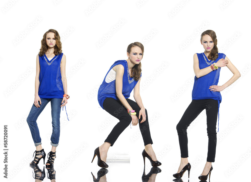 Obraz premium beautiful stylish three girl in jeans posing at studio