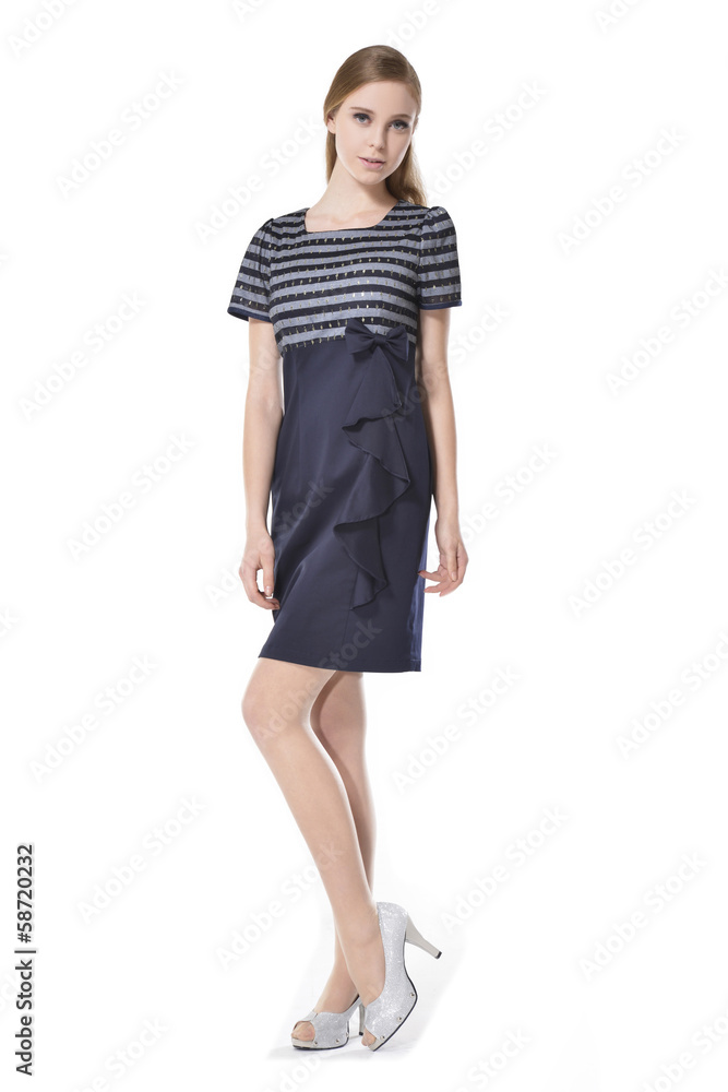 Full length young woman in elegant dress posing Full length young woman in elegant dress posing