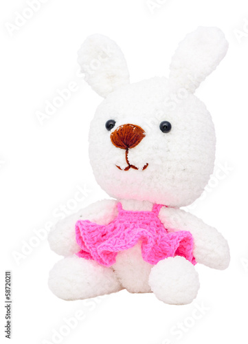 yarn doll on white background © dextorth