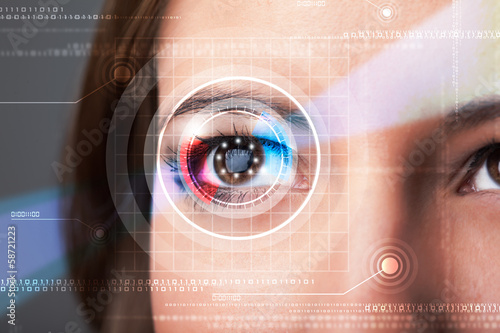 Cyber woman with technolgy eye looking