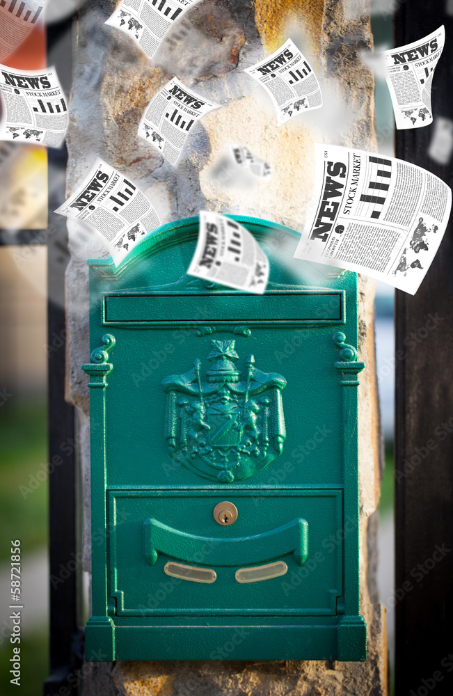 Post box with daily newspapers flying Post box with daily newspapers flying