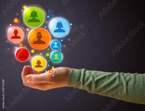 Social network icons in the hand of a woman