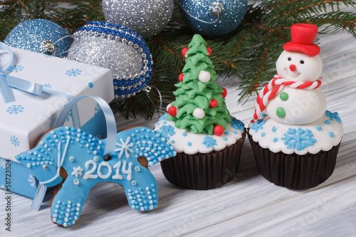 Christmas cake and symbol 2014 blue horse