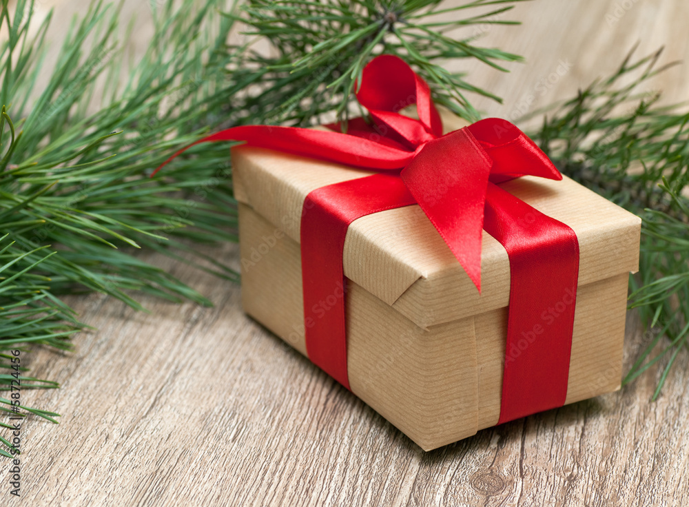 beige gift box with red ribbon beige gift box with red ribbon
