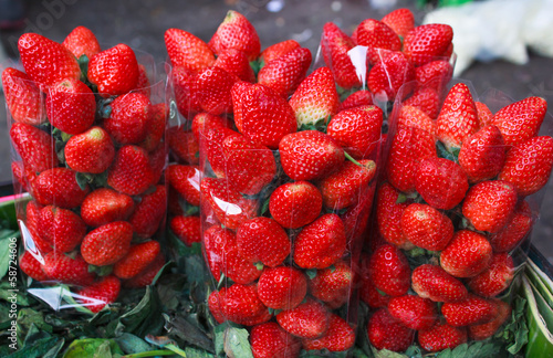 Photography Fresh strawberries on the local market in Bangkok.