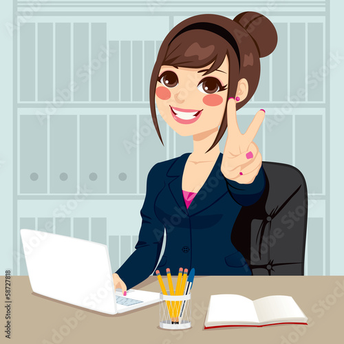 Businesswoman Working At Of...
